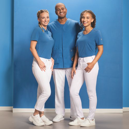 One carer and two female carers wear a team outfit.