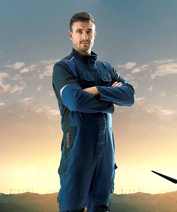 A fitter wears a work overall.