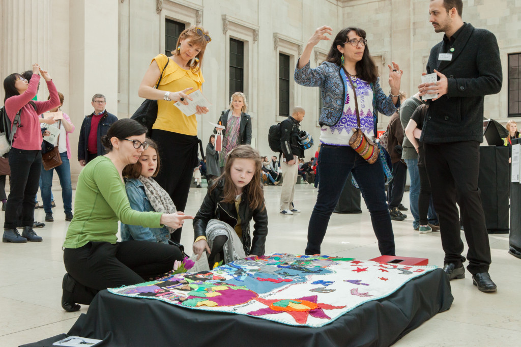 Visitors are shown the Arpillera by members of London Mexico Solidarity. Photo by Amy Scaife